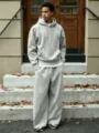 Men's casual solid fleece sports suit, hooded sweatshirt and wide-leg pants detail view. - S / Top And Bottom / Light Gray Set