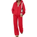 Detail shot of a vibrant red fleece zip hoodie and matching wide leg sweatpants set. - Red