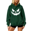 Green Halloween pumpkin print hoodie, casual hooded sweatshirt, spooky autumn pullover top. - S / Tops / Dark Green