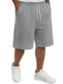 Vista detallada de pantalón corto casual para hombre con cordón de punto gris, ideal. - S / Gris claro