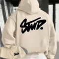 Beige hooded sweatshirt for men and women, featuring a bold black graphic print on the back. - S / Tops / Khaki