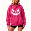Pink Halloween pumpkin hoodie featuring drop shoulders and a fun graphic print for casual wear. - S / Tops / Rose Red
