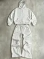 Detailed view of the casual gray hoodie and wide-leg sweatpants set, cozy everyday wear. - Light Gray
