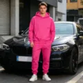 Men's bright pink fleece-lined hooded sweatshirt and sweatpants set, casual variant view. - Rose Red