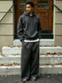 Mens fleece hooded sweatshirt and wide leg sweatpants set casual outfit detail view. - Dark Grey Set