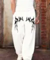 Pantalón de chándal ancho con estampado gótico Y2K para hombres y mujeres streetwear. - Blanco 1