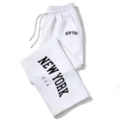Details of white Y2K letter printed loose drawstring sweatpants, casual wide leg lounge pants. - White