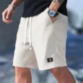 Men's waffle knit casual sports shorts, comfortable fit summer streetwear half pants detail. - S / White