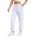 Close-up detail of casual white sweatpants with drawstring and elastic cuffs for daily wear. - S / White