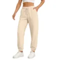 Close-up detail of casual beige sweatpants with elastic drawstring waist and cuffed hem. - Khaki