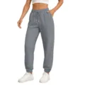 Detail view of comfortable gray casual sweatpants with drawstring and elastic cuffs. - Dark Gray