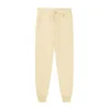 Detailed view of beige fleece sweatpants with drawstring waist and elastic cuffs. - Khaki