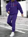 Detail view of men purple hooded sweatshirt and sweatpants set with letter print and drawstrings. - 2XL / Top And Bottom / Purple
