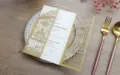 Detail of an elegant laser-cut wedding invitation featuring intricate gold hollow patterns. - Invitation Set (With Inner Page Printing) / Dark Gold