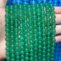 Close-up of translucent green natural chalcedony agate round beads for DIY jewelry - Green Aventurine