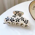 Elegant beige acrylic hair claw clip featuring black floral cutout patterns in Korean style - Beige-Winter Jasmine