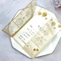 Elegant laser cut gold wedding invitation card with embossed floral patterns on white plate - Invitation Set (With Inner Page Printing) / Champagne Gold