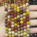 Detailed view of multi-colored natural agate jasper round beads for DIY bracelet making - Yellow Jasper