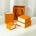 Coffret à bijoux haut de gamme en papier recyclé orange pour bagues et boucles d'oreilles - Boîte Tiroir Jaune Bronze / Sac fourre-tout 11*12*6cm