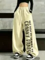 Women casual loose wide leg sweatpants with drawstring and fashion letter print for autumn. - S / Apricot
