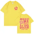 Gelbes kurzarm Baumwoll-T-Shirt mit retro Strand Ozean Grafik auf der Rueckseite. - Gelb