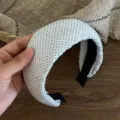 Detailed shot of retro polka dot wide headband, soft fabric texture and neat interior lining. - White Polka Dot Style