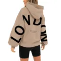 Oversized beige hoodie for women featuring drop shoulders and stylish London letter print. - S / Tops / Camel & Black Label