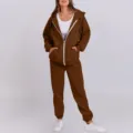Detailed view of the women's brown fleece-lined zip hoodie and matching sweatpants set. - Dark Brown
