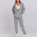 Detailed view of casual gray hooded zip sweatshirt and sweatpants set features soft fabric. - Light Gray