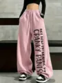 Women Pink Fleece Lined Loose Wide Leg Sweatpants with Drawstring & Slogan Print - Pink