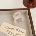 Medium pearlescent acetate hair claw clip for women, elegant octopus hair catch accessory. - Pearl White