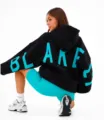 Women black oversized hoodie with cyan letter print and matching biker shorts streetwear style. - Black Blue Label