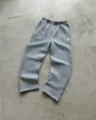 Grey casual sweatpants detail with wide leg design, bottom hem slit and embroidered logo. - S / Bottoms / Light Gray