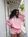 Pink fleece crewneck sweatshirt and shorts set with collegiate arch letter print for women. - XS / Top And Bottom / Pink with Yellow Letters