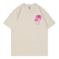 Lässiges, beigefarbenes Kurzarm-T-Shirt mit rosa Palmen-Grafikdesign für Damen. - S / Oberteile / Beige