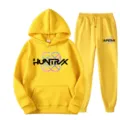 Bright yellow hooded sweatshirt and matching sweatpants set with chest graphic print. - S / Top And Bottom / Yellow