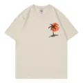 Lässiges beige Kurzarm-T-Shirt für Damen mit trendigem Sonnenuntergang-Palmen-Print. - Beige