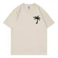 Beige short sleeve crewneck t-shirt featuring a black palm tree graphic print for women. - S / Tops / Beige