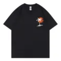 Black short sleeve t-shirt with tropical palm tree and sunset graphic for women daily wear. - S / Tops / Black