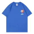 Blue short-sleeve T-shirt featuring a stylish sunset palm tree chest graphic for daily wear. - S / Tops / Sapphire Blue