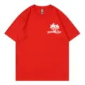 Red short sleeve cotton crewneck t-shirt featuring white palm tree graphic and text print. - S / Tops / Red