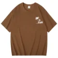 Brown short sleeve t-shirt with tropical palm tree print and comfortable loose fit top. - S / Tops / Coffee
