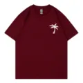 Burgundy short sleeve crewneck t-shirt featuring a white palm tree graphic on the left chest. - S / Tops / Burgundy