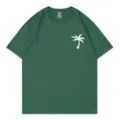 Casual green short sleeve t-shirt featuring a white palm tree chest print for women. - S / Tops / Dark Green