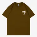 Casual olive green short sleeve t-shirt with a white palm tree graphic on the left chest. - S / Tops / Coffee
