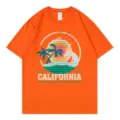 Orange casual short sleeve t-shirt featuring a retro California beach sunset graphic print. - Orange