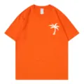 Orange short sleeve t-shirt for women with palm tree chest graphic casual crew neck top - S / Tops / Orange