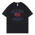 Black cotton crewneck short sleeve t-shirt with patriotic slogan print for daily casual wear. - S / Tops / Black