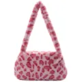 Close-up detail of a soft pink faux fur underarm bag with chic animal pattern print - Pink Leopard