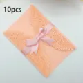 Set of 10 elegant peach pink laser-cut wedding invitation cards with satin ribbon bow - 10 Pieces Pack / QT-04 Pink